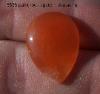 Carnelian Paint Rock Agate that has been cut and polished into a cabochon.