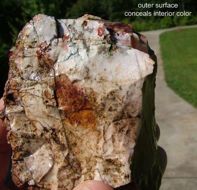 Paint rock agate showing white exterior hiding red interior